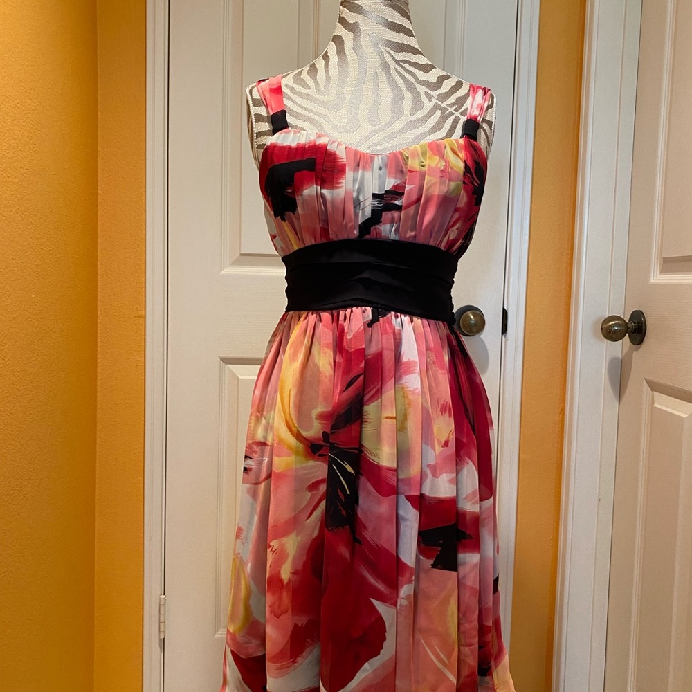 Cute summer dress casual or dressy!  Very flowy and figure flattering!